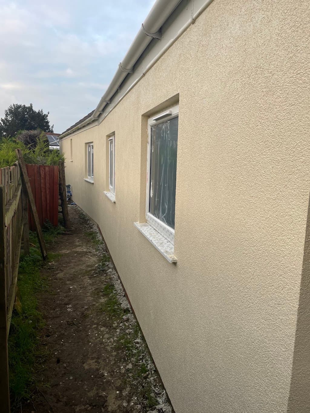 Dean Martins coloured K Rend Specialist and plasterering