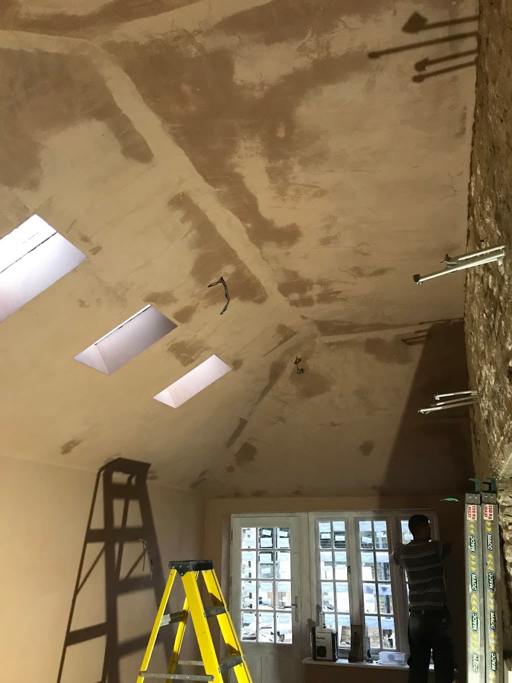 Alby's building + plastering
